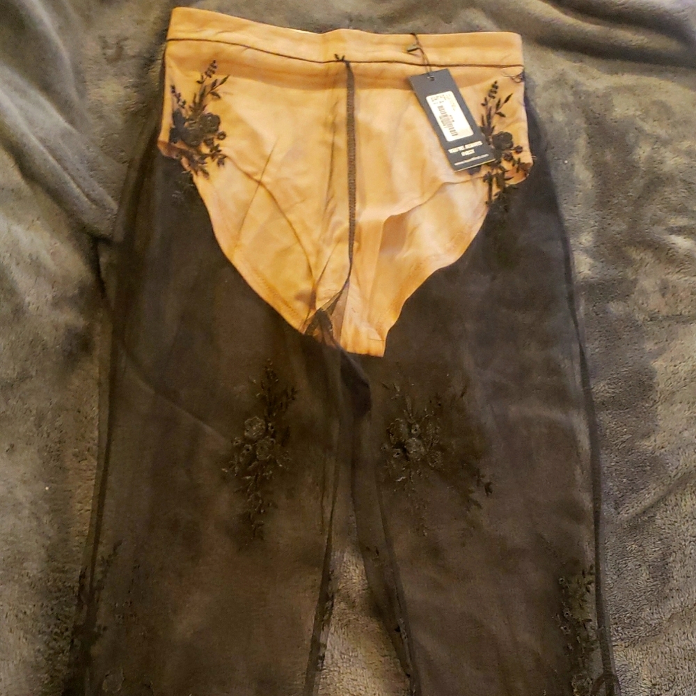 Black sheer lace trousers